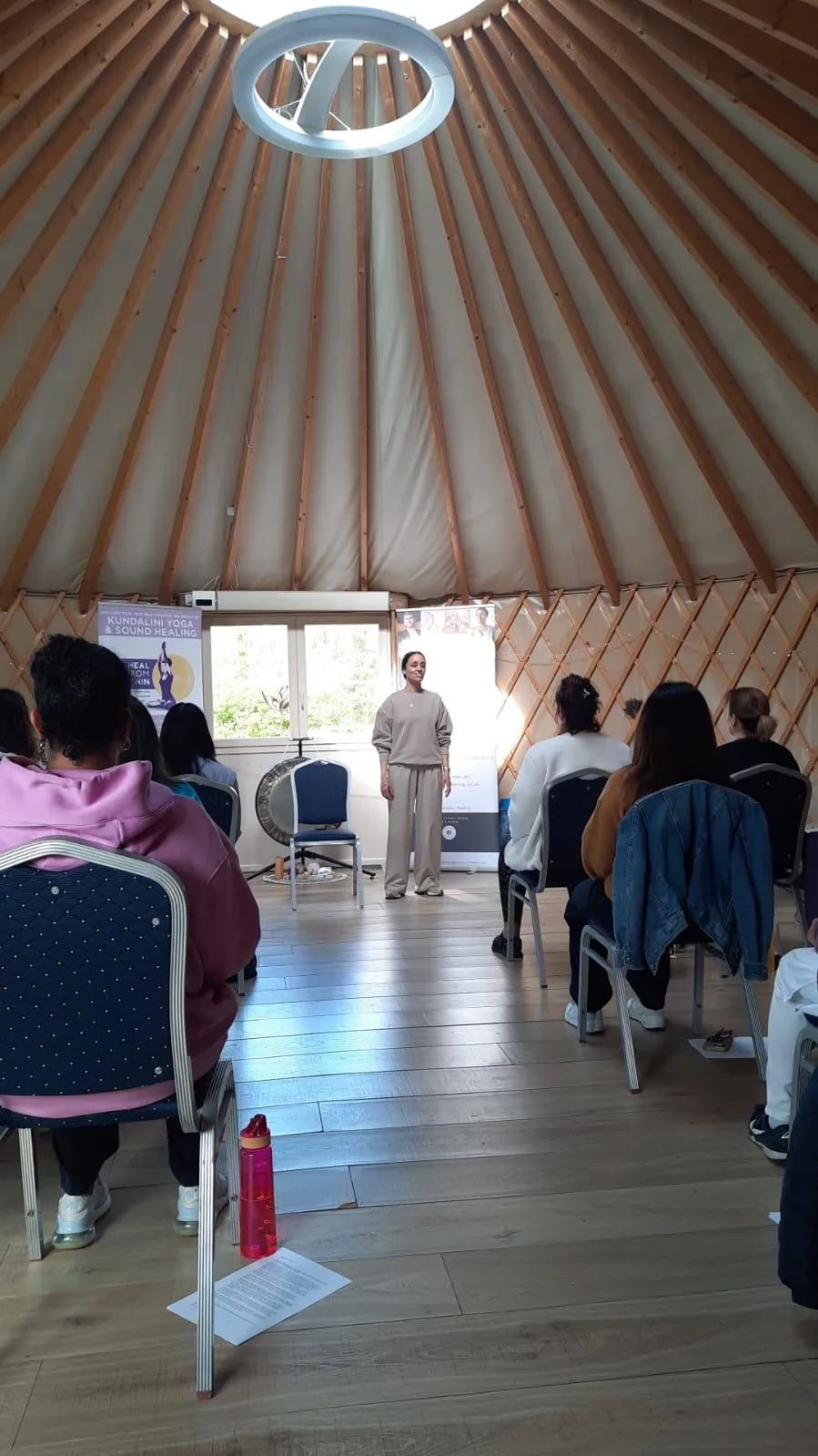 Sharon Sidhu leading a session in the yurt at the Wellness Day Retreat, April 2026